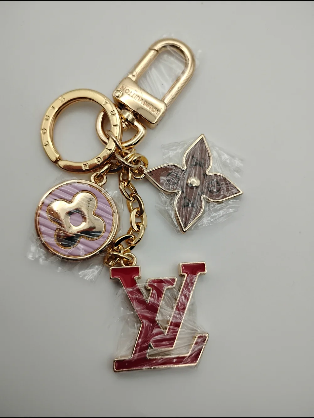 Louis Vuitton Red & Gold-Tone Keychain Charm With Pink and Brown Accents BNWOT